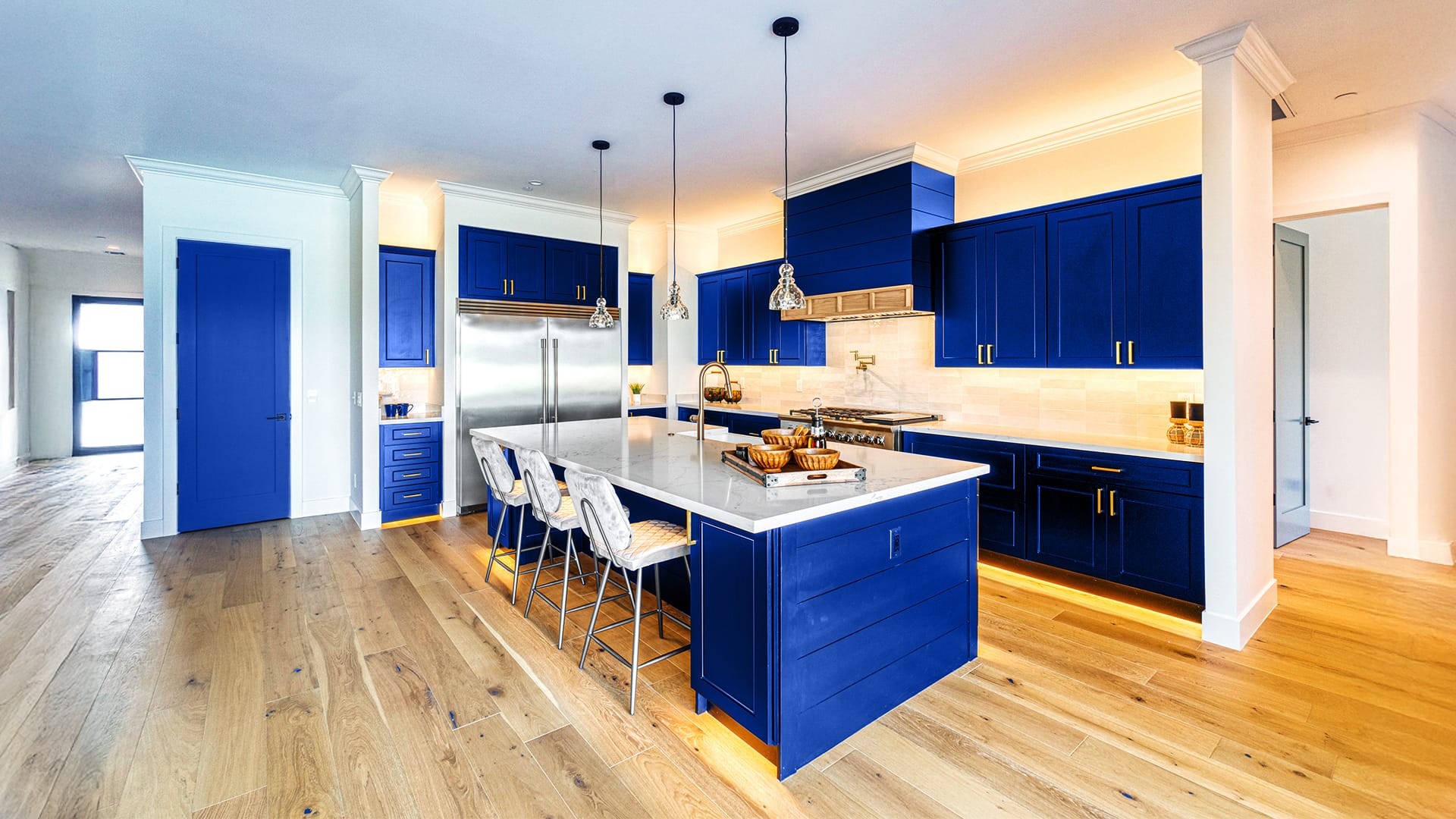 blue kitchen with excellent lighting