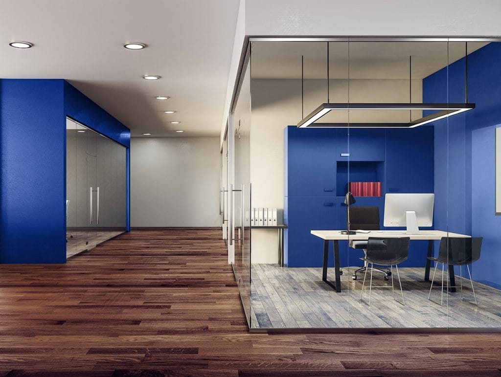 blue office with glass doors and hanging lights